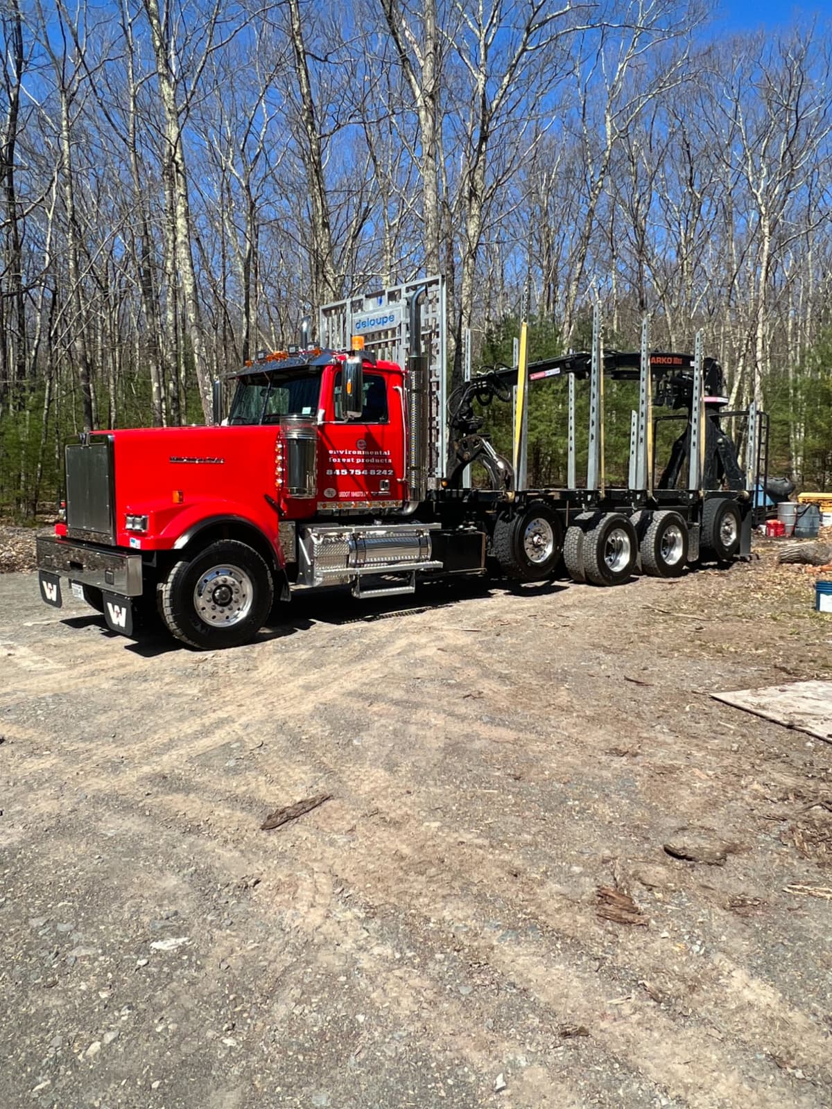 EFP log truck with pup trailer hauling timber