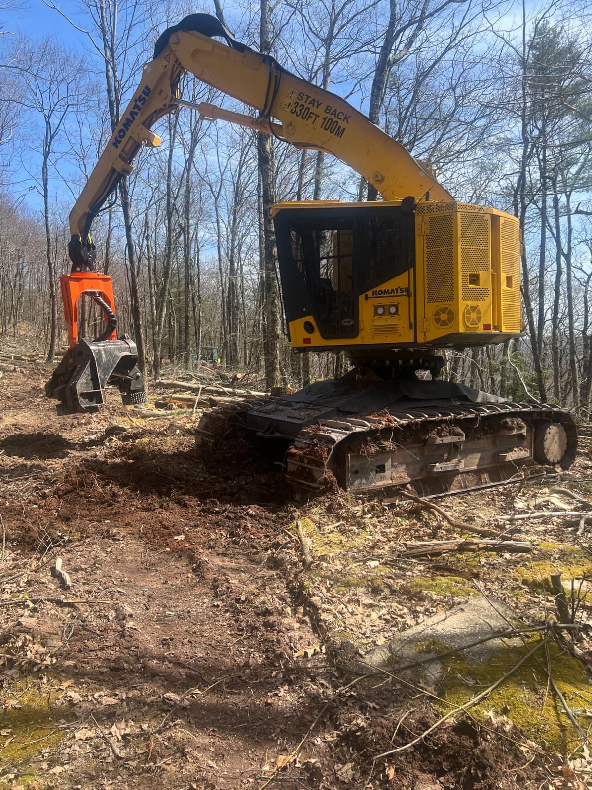 Komatsu XT445L tracked feller buncher during a timber harvest in New York — Environmental Forest Products
