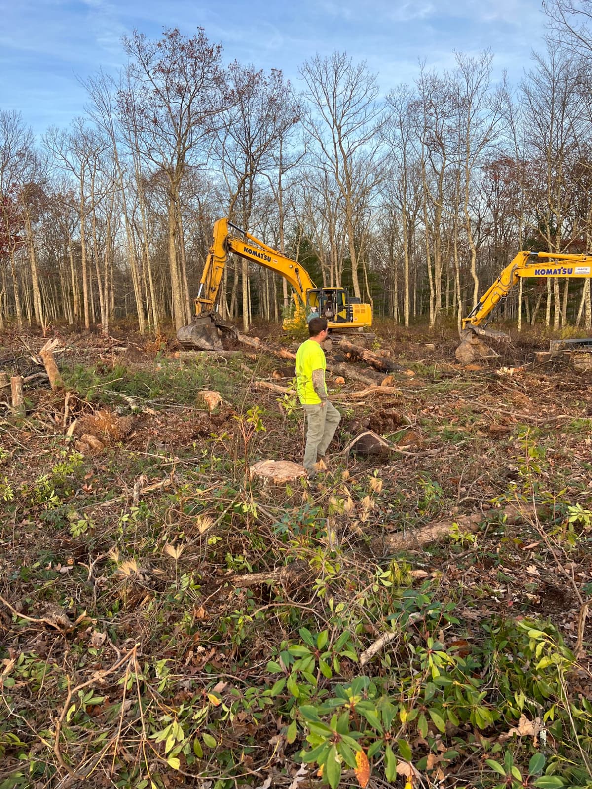Land clearing project in Forestburgh, NY — Komatsu excavators clearing second-growth forest for site preparation