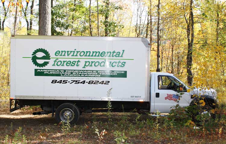 EForestProducts Truck White truck with a decal Environmental Forest Products